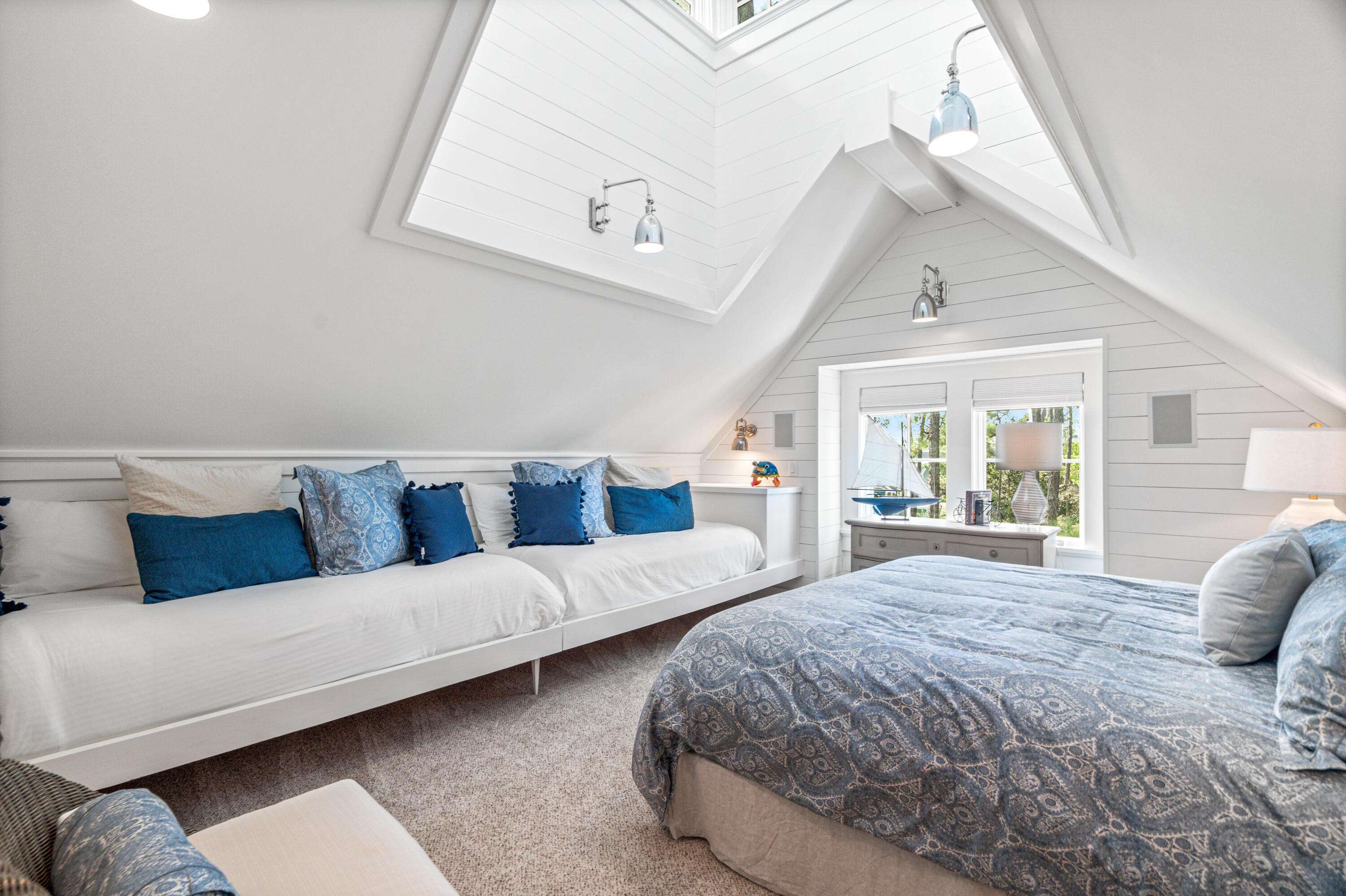 8 Shingle Lane Watersound, FL 32461 - Photo 50 of 73 a spacious bedroom with a large bed and a couch