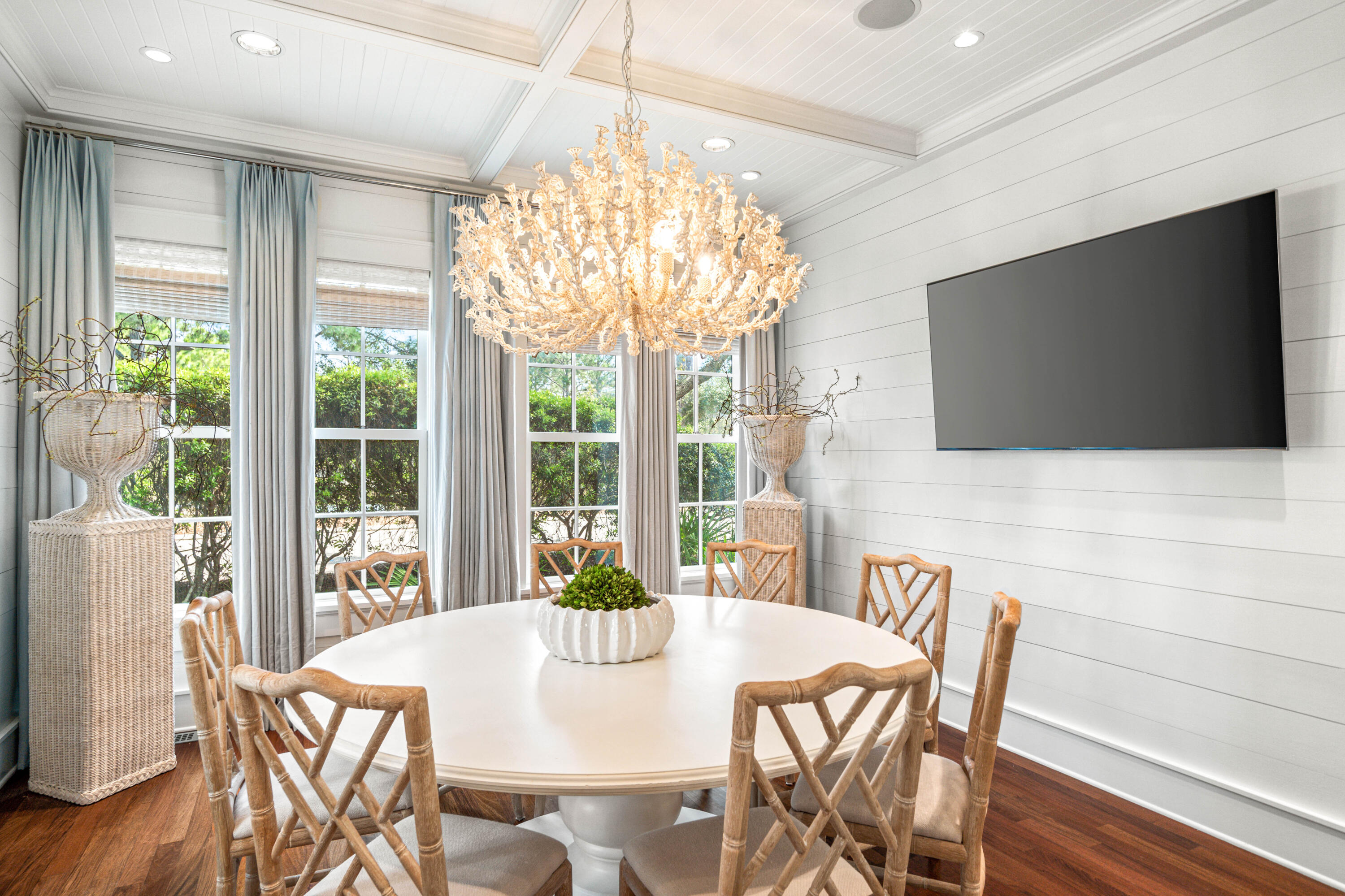 8 Shingle Lane Watersound, FL 32461 - Photo 9 of 73 a view of a dining room with furniture wooden floor and chandelier