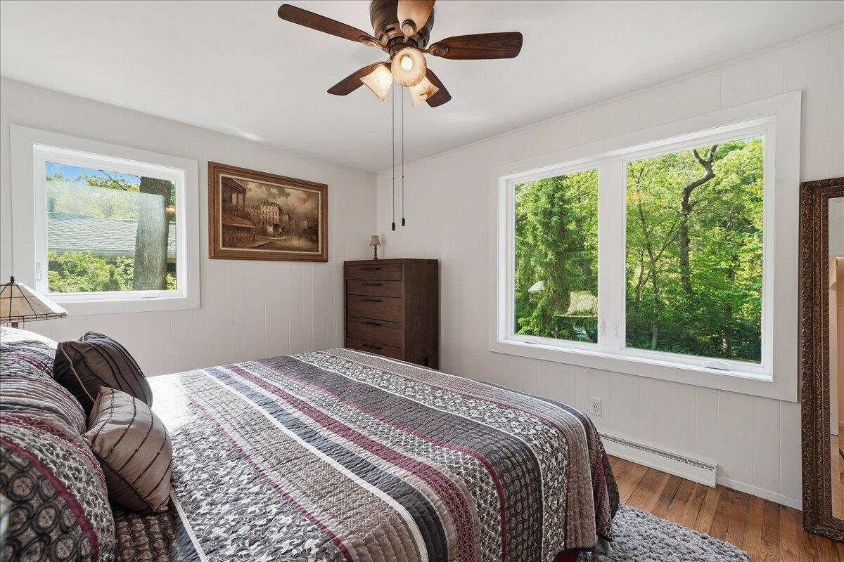 63 Ski Hill Road Portage, IN 46368 - Photo 13 of 28 a bedroom with a bed and a window