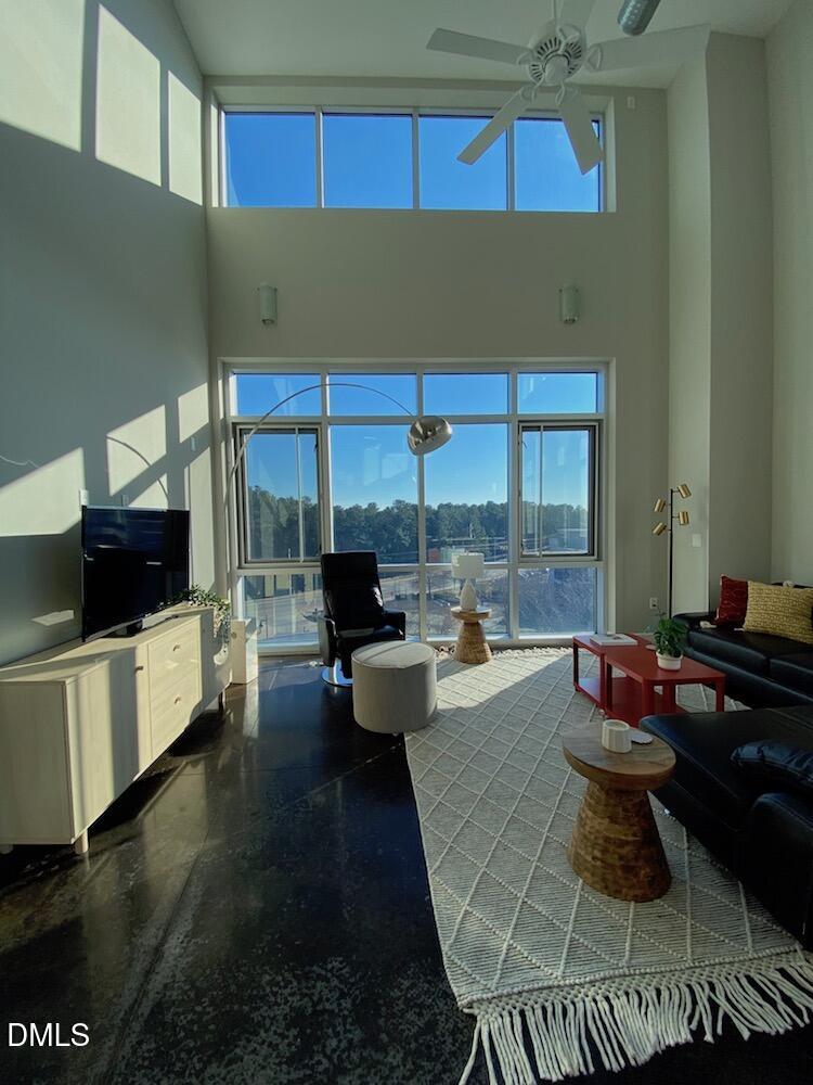 2608 Erwin Road, Unit 430 Durham, NC 27705 - Photo 13 of 43 a living room with furniture and a fireplace