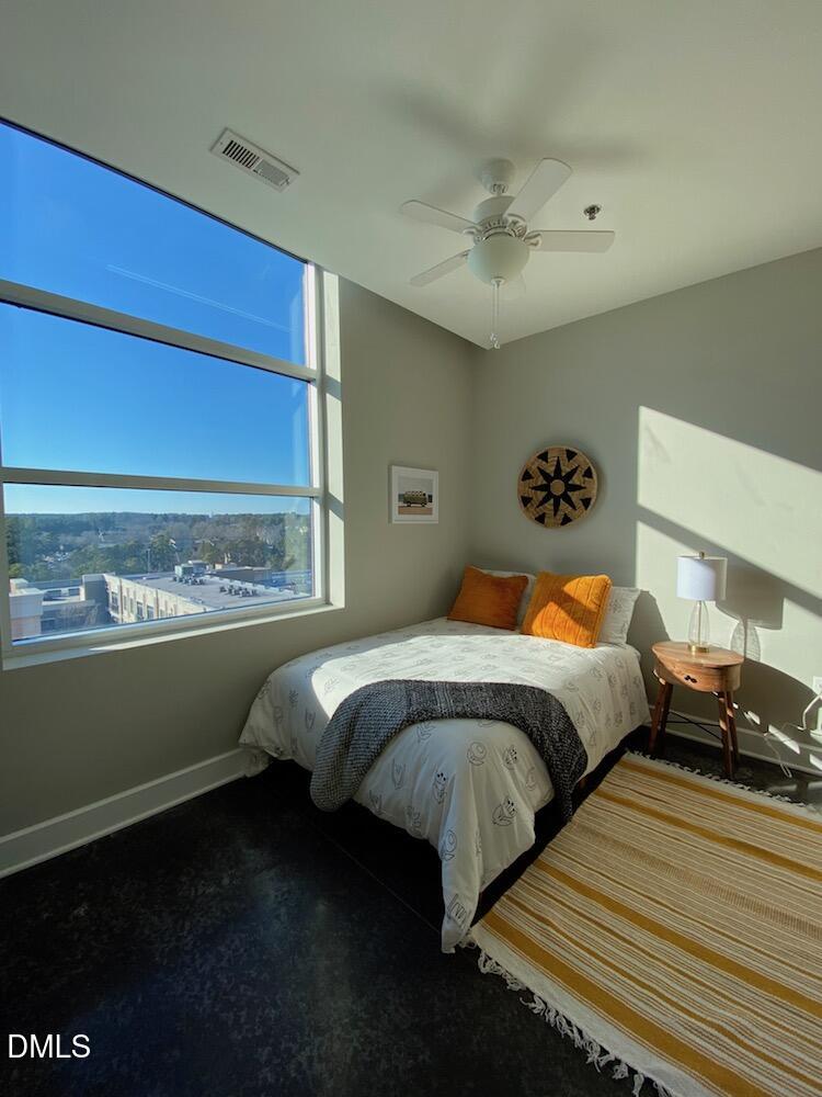 2608 Erwin Road, Unit 430 Durham, NC 27705 - Photo 20 of 43 a bedroom with a bed and window