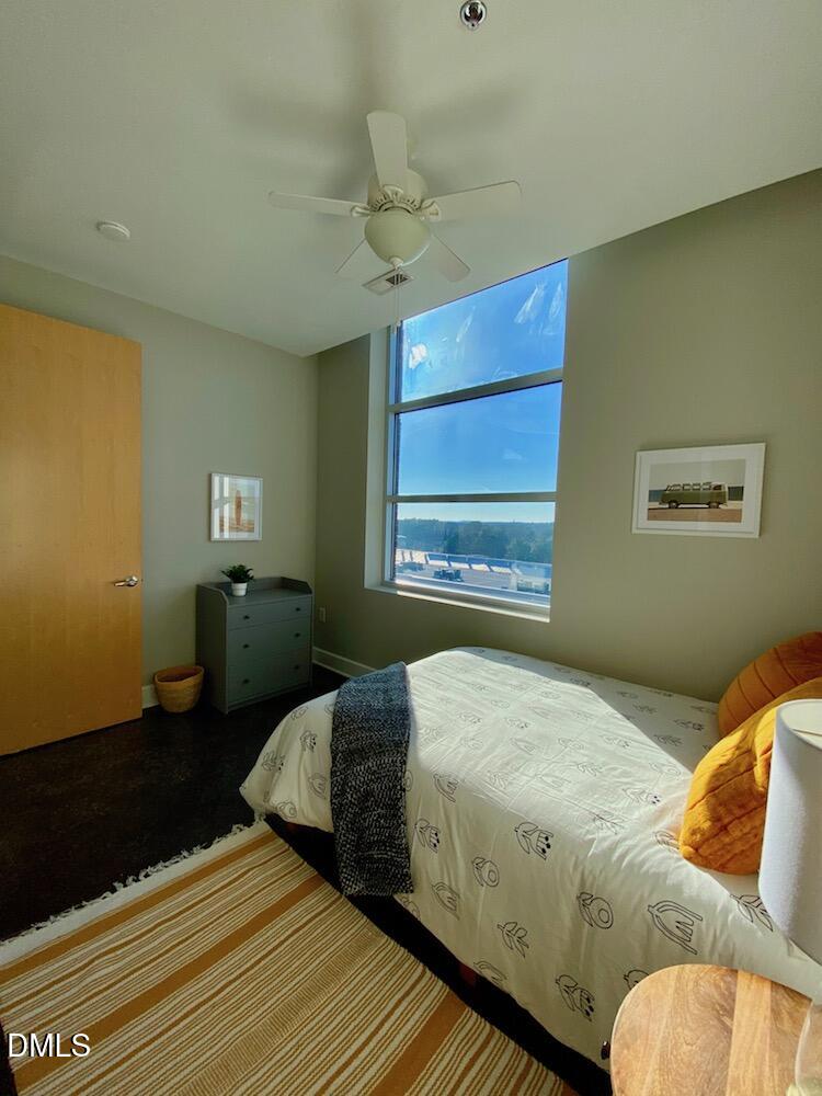 2608 Erwin Road, Unit 430 Durham, NC 27705 - Photo 22 of 43 a bedroom with a bed and window
