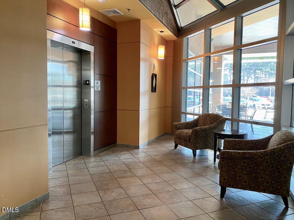 2608 Erwin Road, Unit 430 Durham, NC 27705 - Photo 3 of 43 a living room with furniture and a window