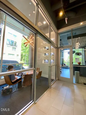 a kitchen with a table and chairs