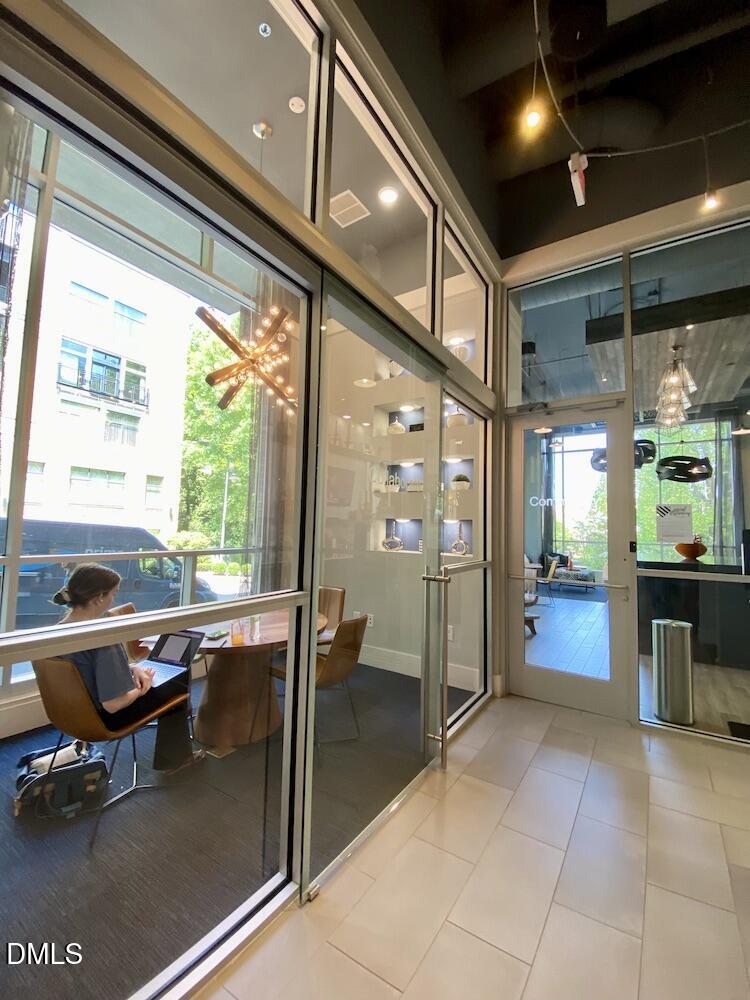 2608 Erwin Road, Unit 430 Durham, NC 27705 - Photo 36 of 43 a kitchen with a table and chairs