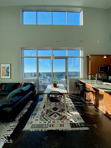 a living room with large window