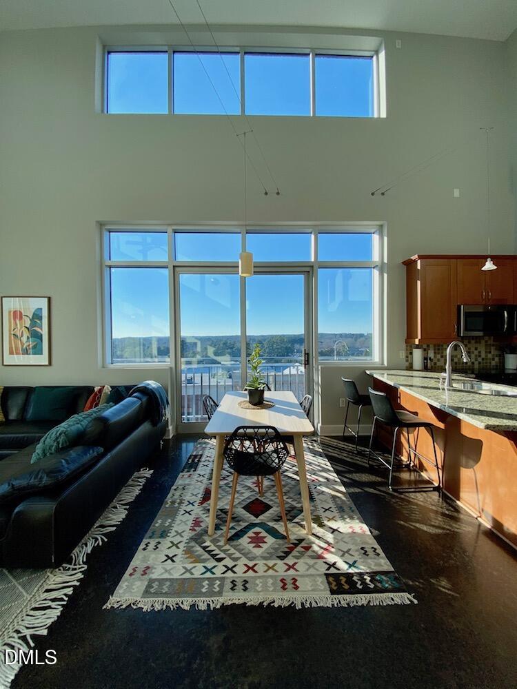 2608 Erwin Road, Unit 430 Durham, NC 27705 - Photo 9 of 43 a living room with large window