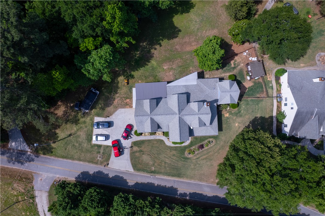 1504 Double Springs Road Townville, SC 29689 - Photo 35 of 41 An aerial view captures the property's expansive grounds and well-maintained roof.