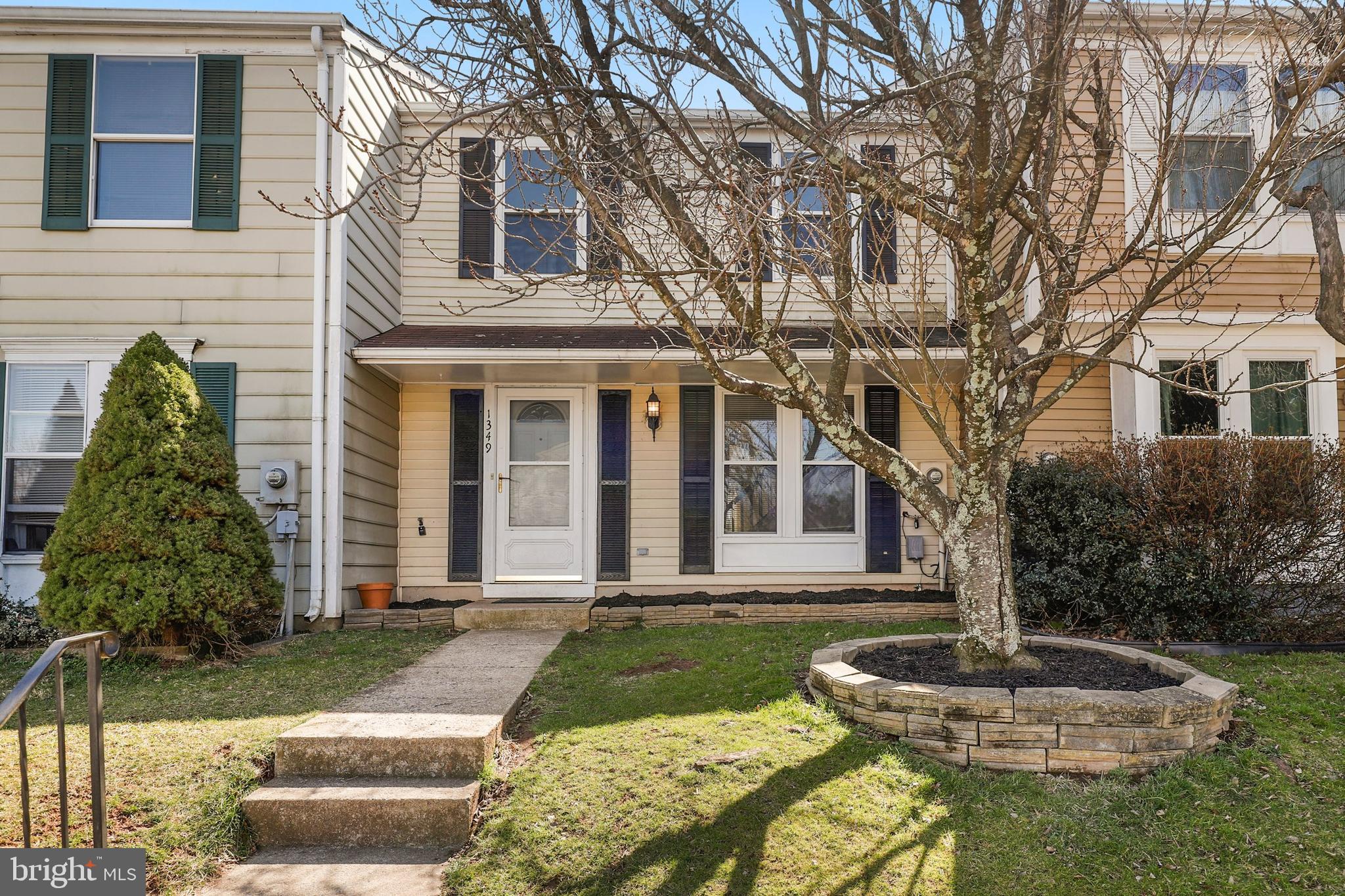 1349 David Lane Frederick, MD 21703 - Photo 1 of 24 a front view of a house with garden