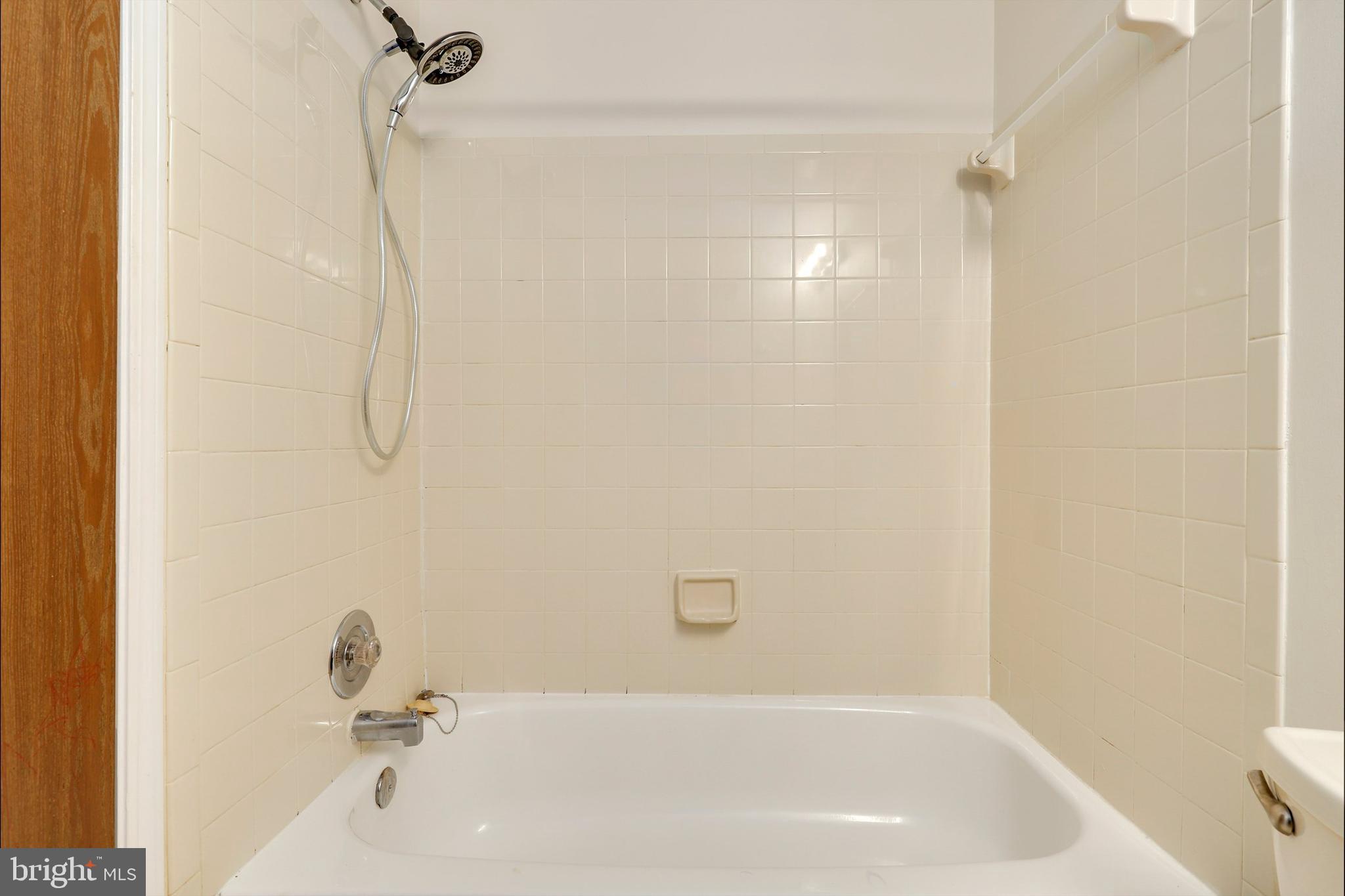 1349 David Lane Frederick, MD 21703 - Photo 16 of 24 a bathroom with a bathtub