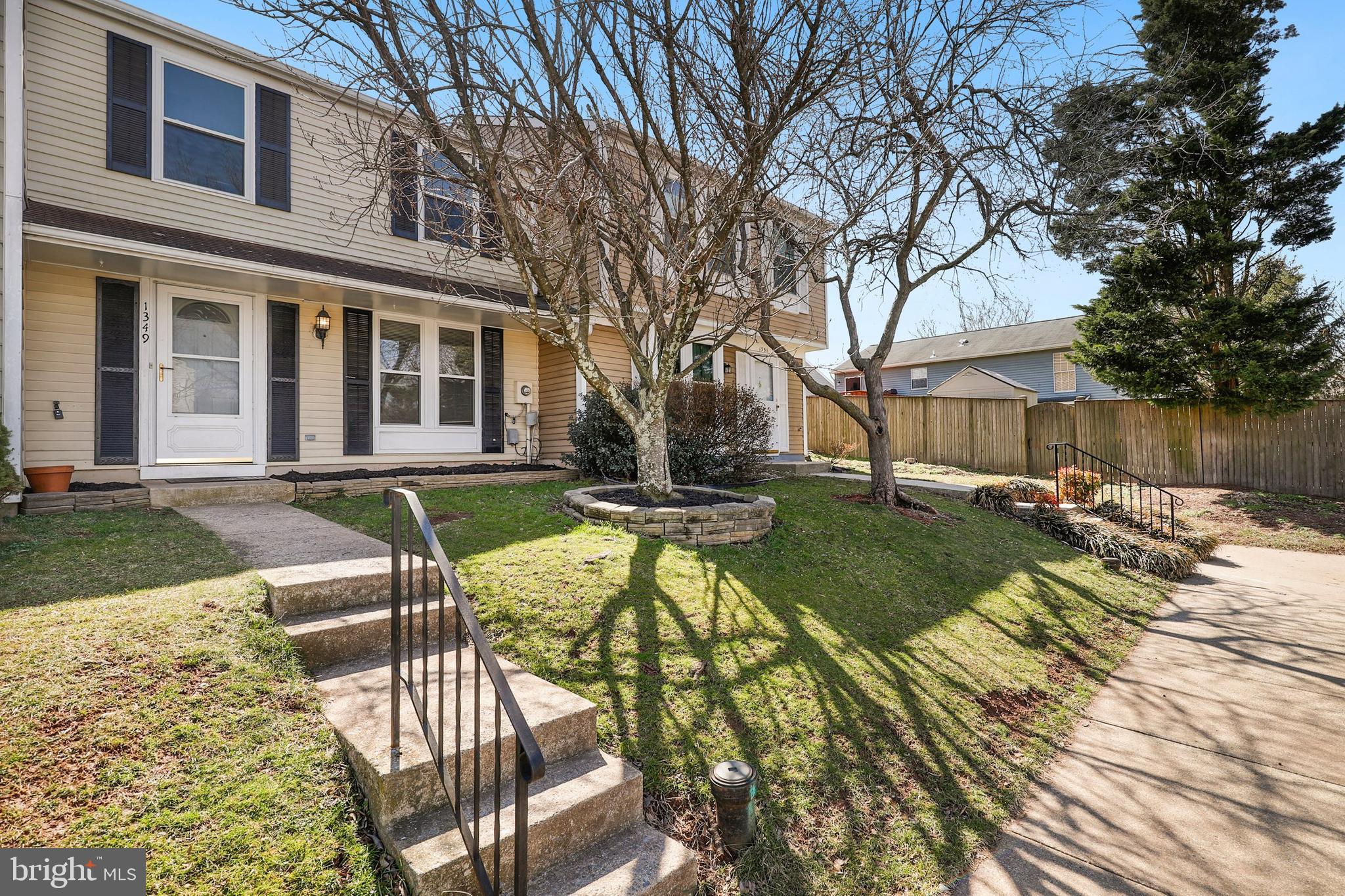 1349 David Lane Frederick, MD 21703 - Photo 2 of 24 a view of a house with backyard and sitting area