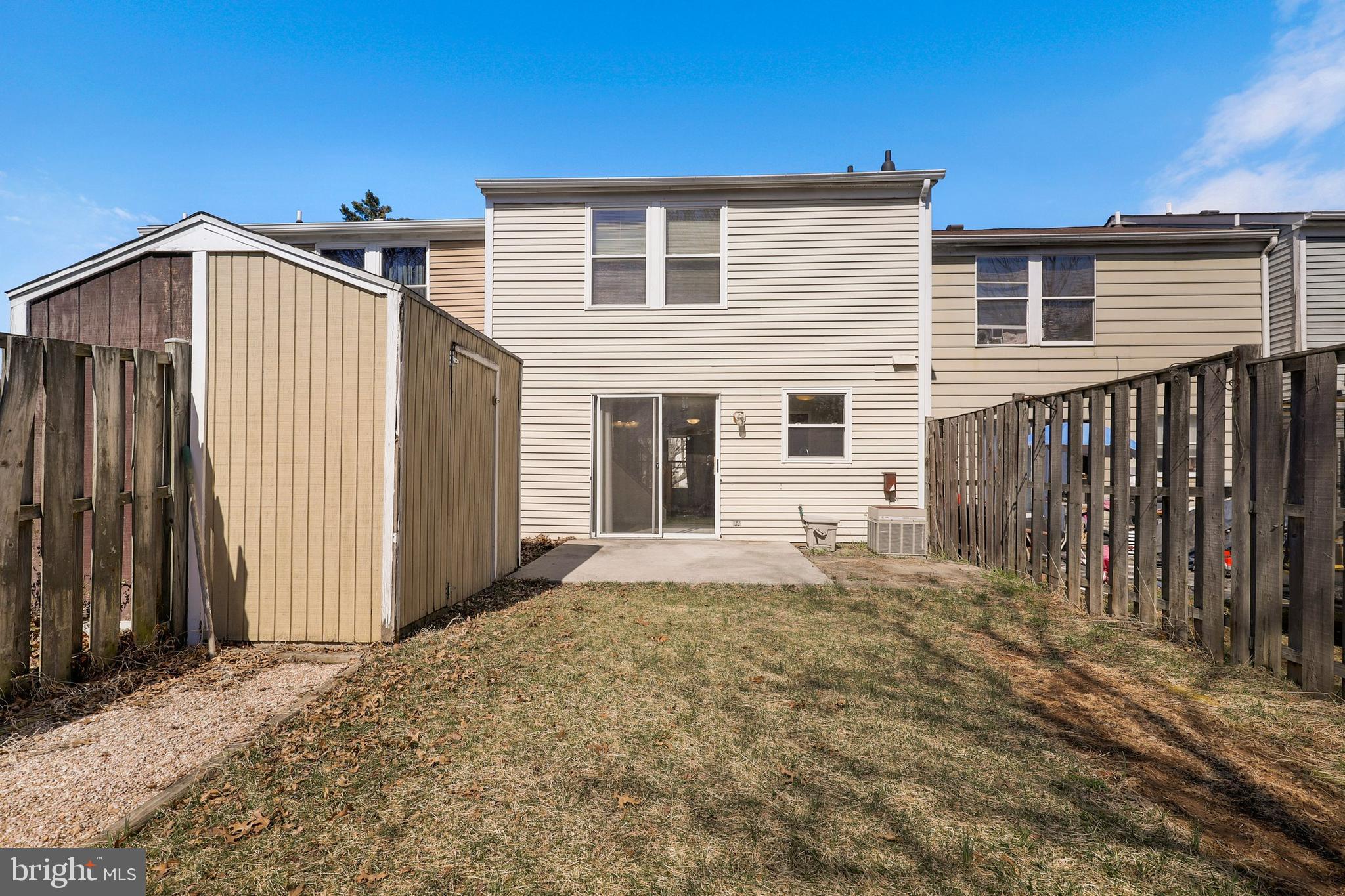 1349 David Lane Frederick, MD 21703 - Photo 22 of 24 a front view of a house with a yard