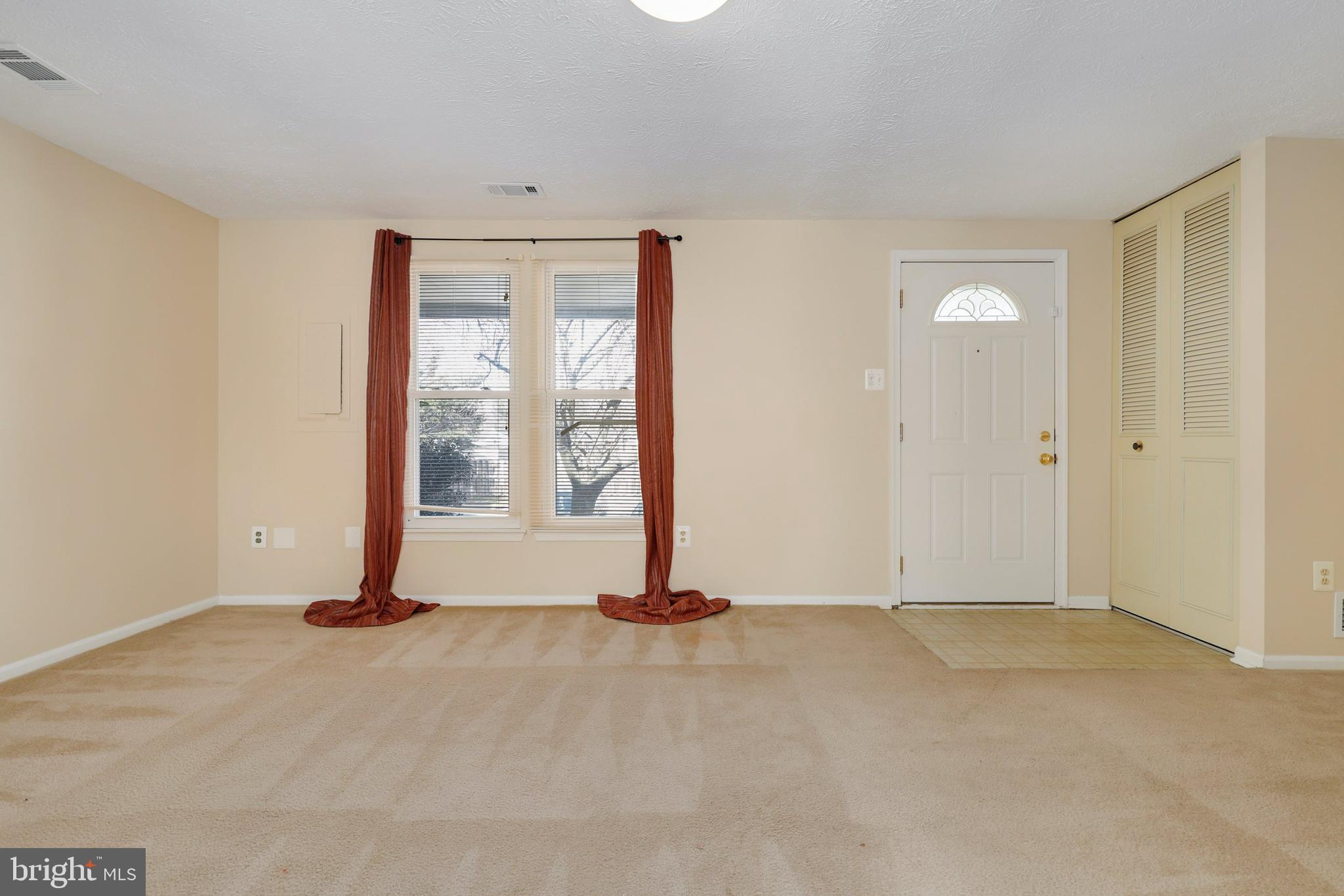 1349 David Lane Frederick, MD 21703 - Photo 4 of 24 a view of an empty room with window