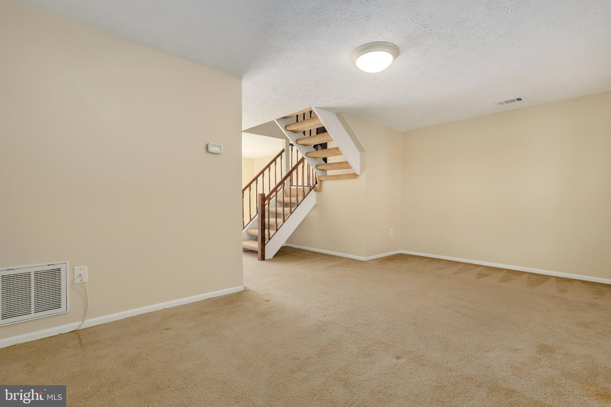 1349 David Lane Frederick, MD 21703 - Photo 5 of 24 an empty room with windows