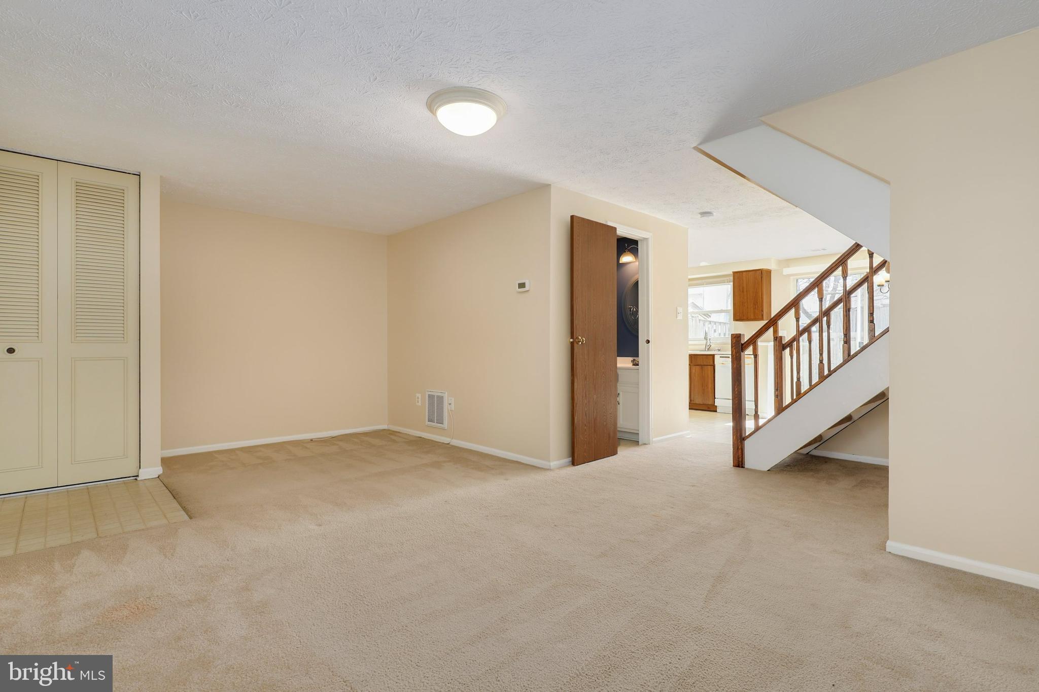 1349 David Lane Frederick, MD 21703 - Photo 6 of 24 a view of an empty room with window