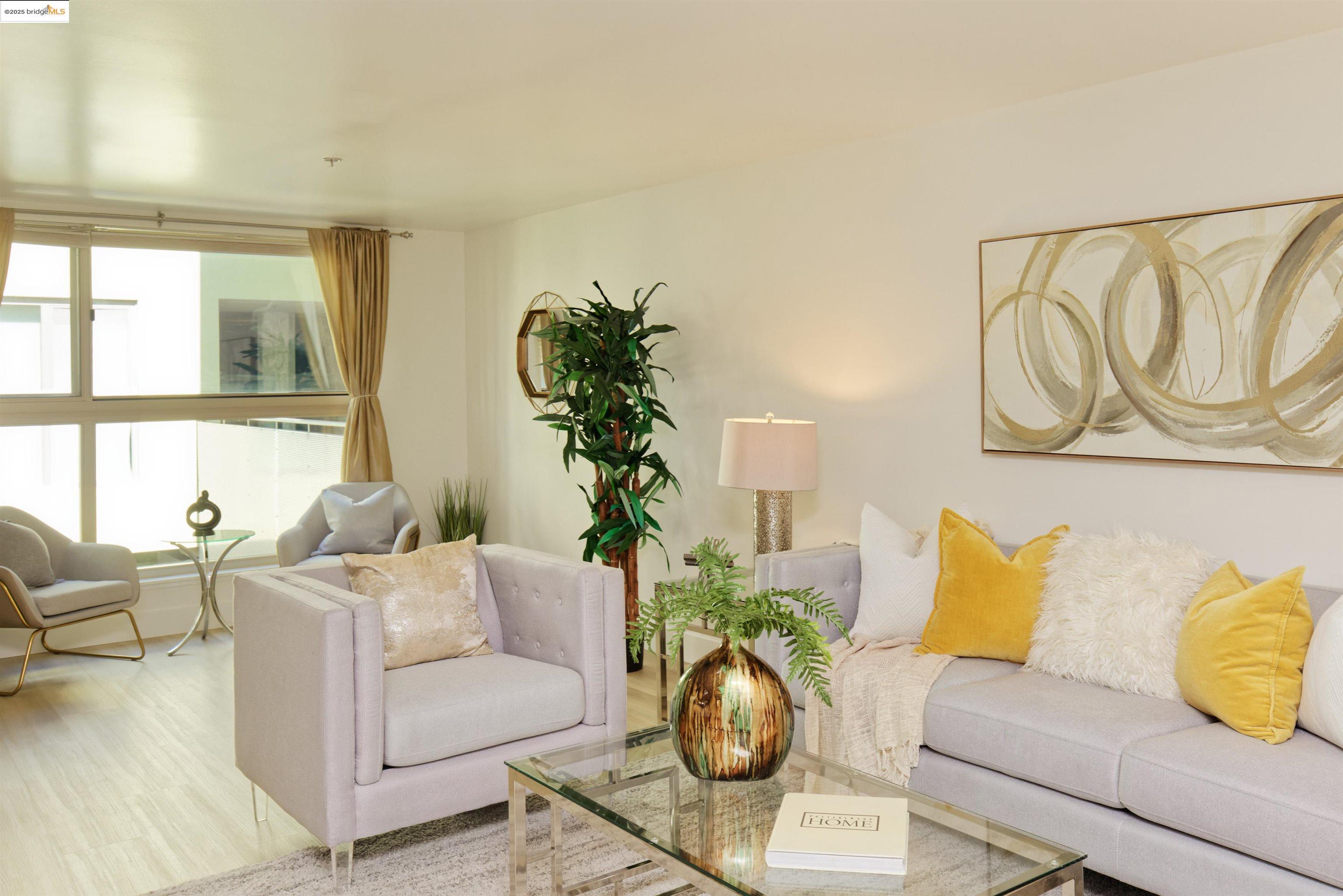 1201 Pine Street, Unit 315 Oakland, CA 94607 - Photo 2 of 41 Living area with wood finished floors