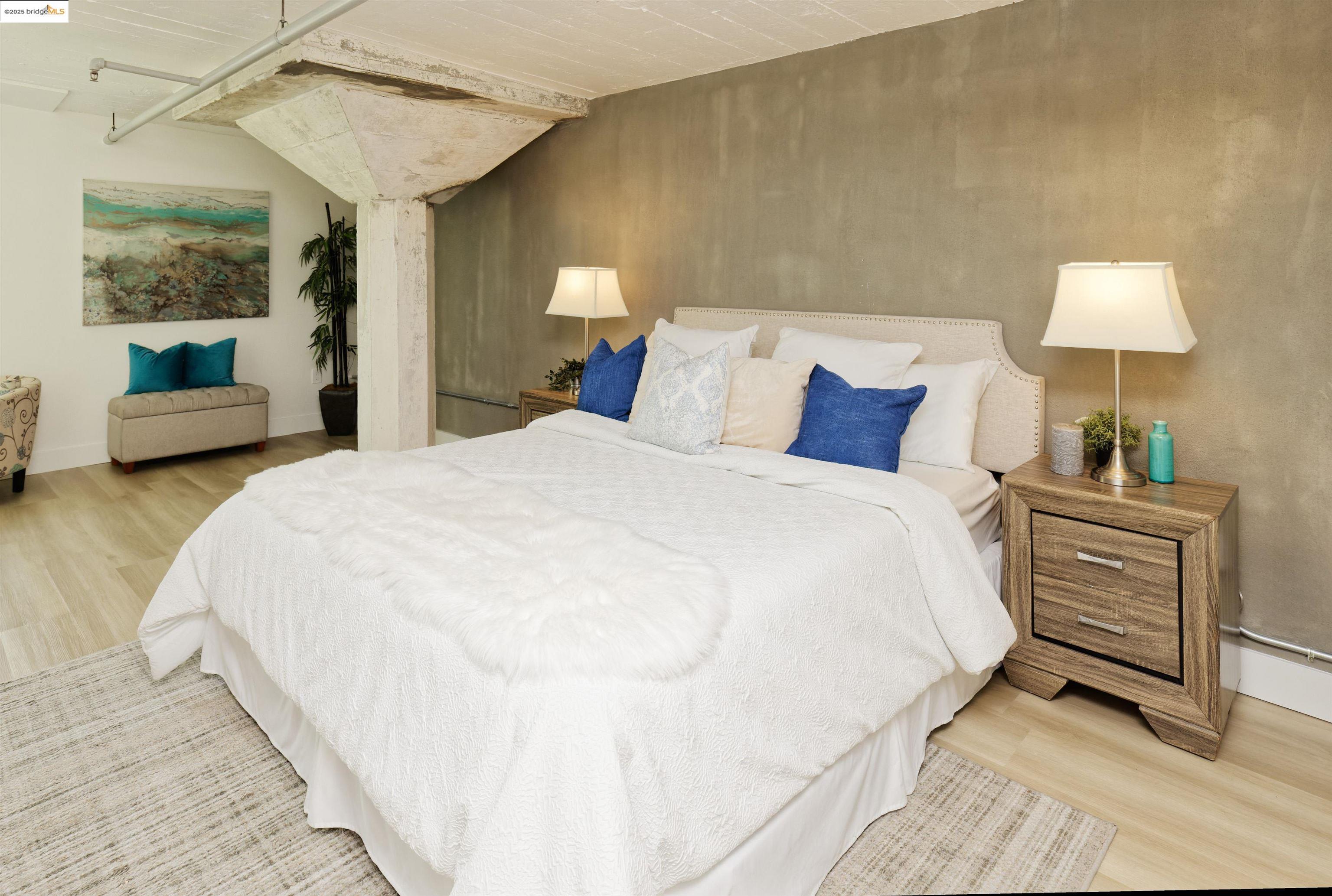 1201 Pine Street, Unit 315 Oakland, CA 94607 - Photo 23 of 41 Bedroom with light wood-type flooring