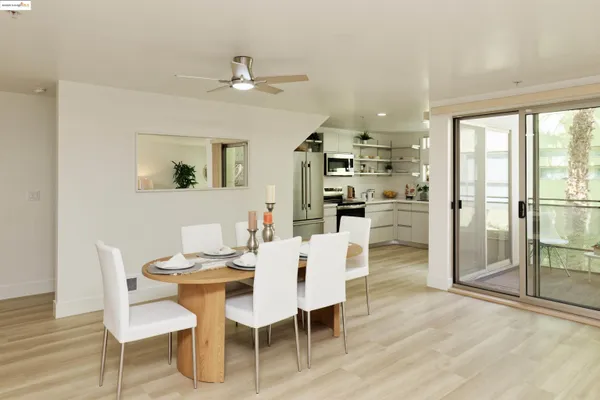 a view of a dining room with furniture