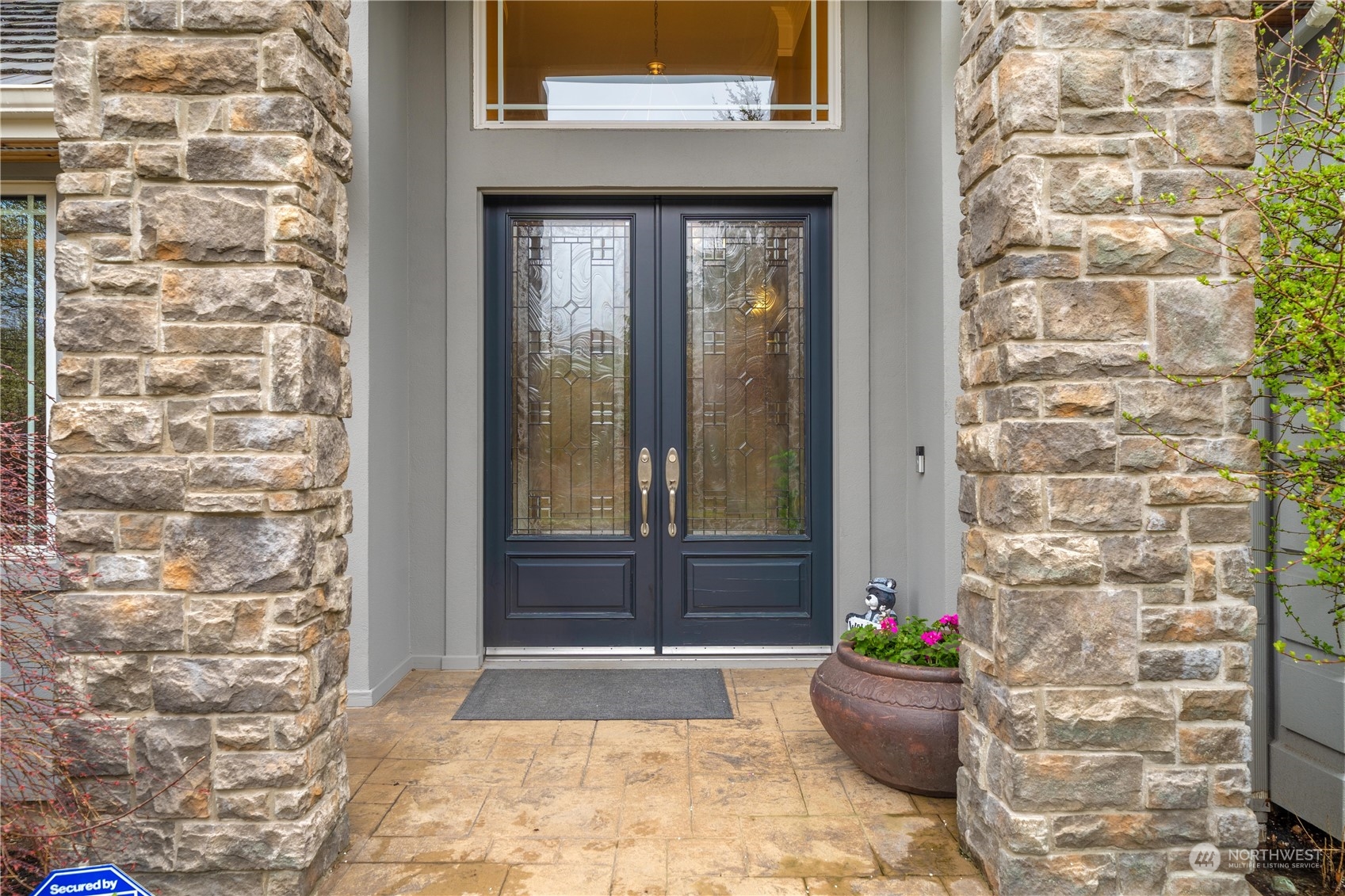 a front view of a house with outdoor space