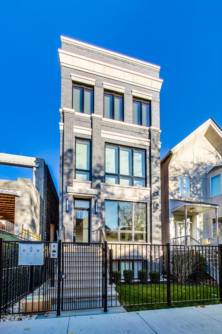 2761 North Kenmore Avenue, Unit 3 Chicago, IL 60614 - Photo 1 of 33 a front view of a house with iron fence