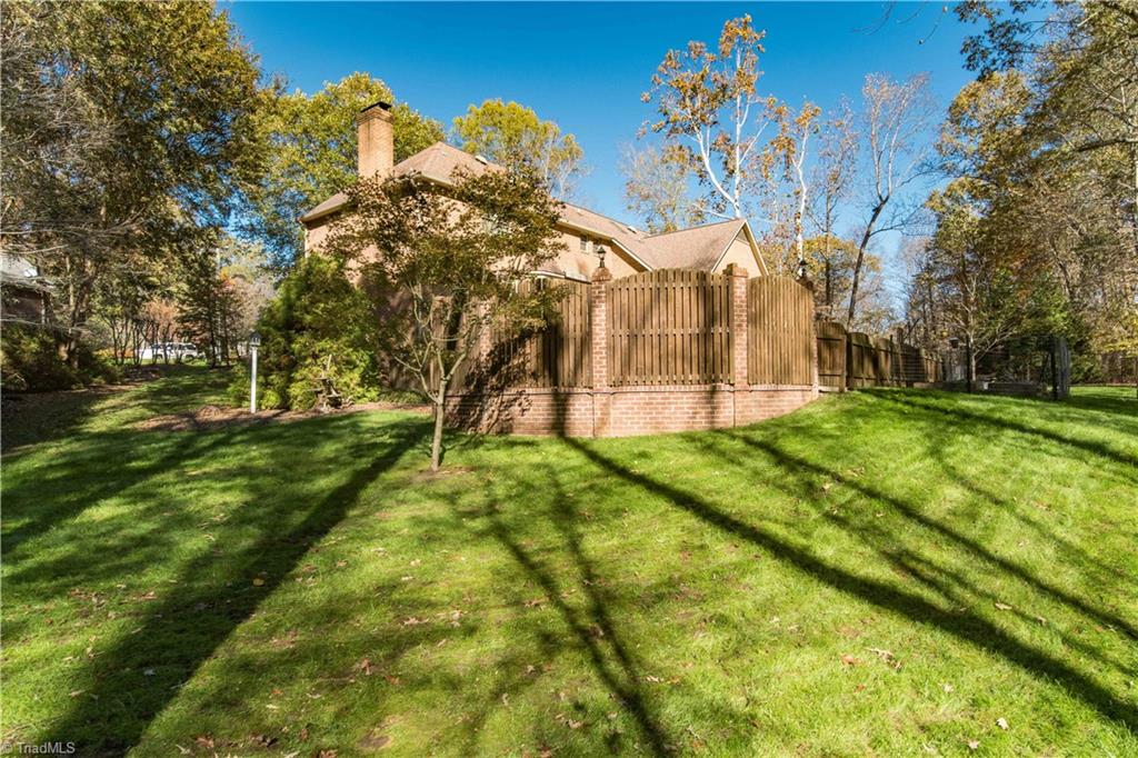 4400 Preston Point High Point, NC 27265 - Photo 48 of 49 Yard with view to raised garden beds.