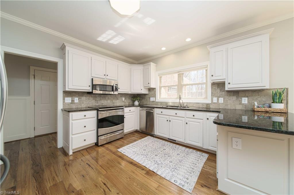 4400 Preston Point High Point, NC 27265 - Photo 7 of 49 Kitchen, Solid Cherry Kitchen Cabinets painted white, Main Level.
