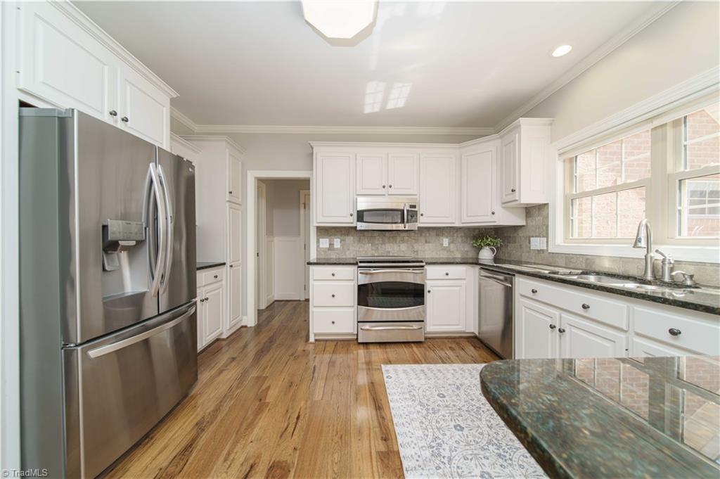 4400 Preston Point High Point, NC 27265 - Photo 8 of 49 Kitchen, Solid Cherry Kitchen Cabinets painted white, Main Level.