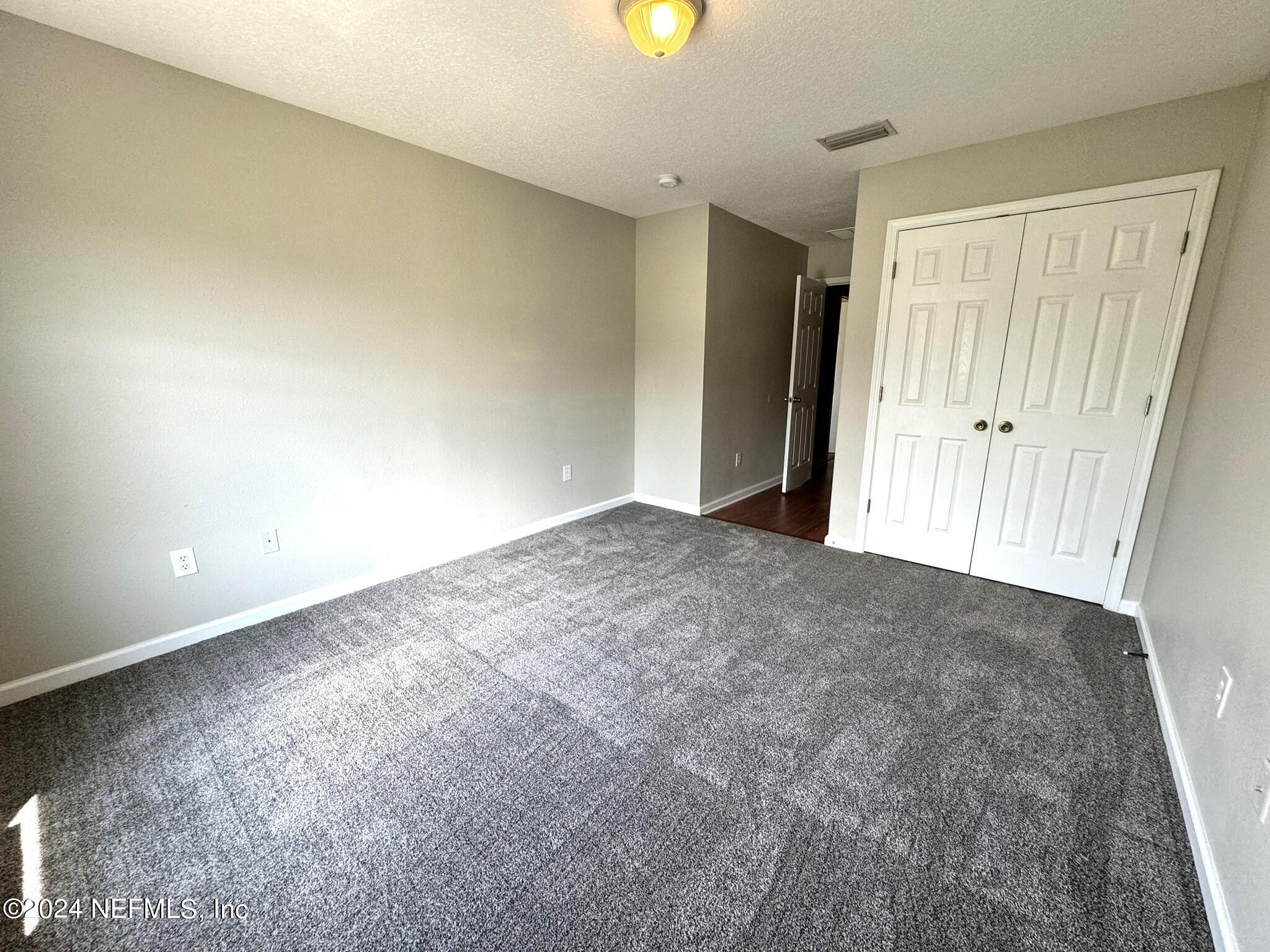 1500 Calming Water Drive, Unit 1003 Fleming Island, FL 32003 - Photo 12 of 13 a view of an empty room