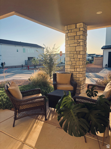 629 Spring Lily Drive St. George, UT 84790 - Photo 2 of 50 Front porch with a stone-clad pillar and recessed lighting