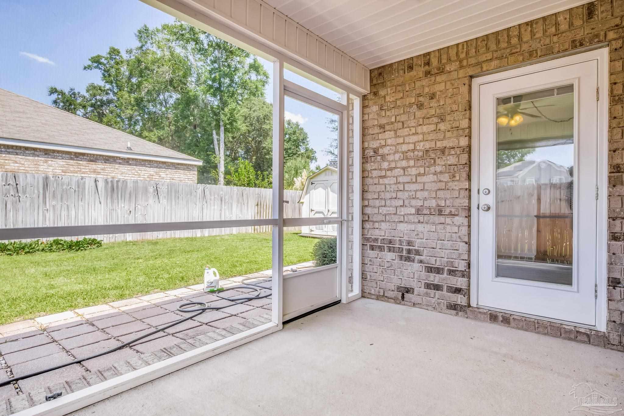 4706 Apple Field Way Milton, FL 32571 - Photo 20 of 52 a balcony with view of an outdoor space