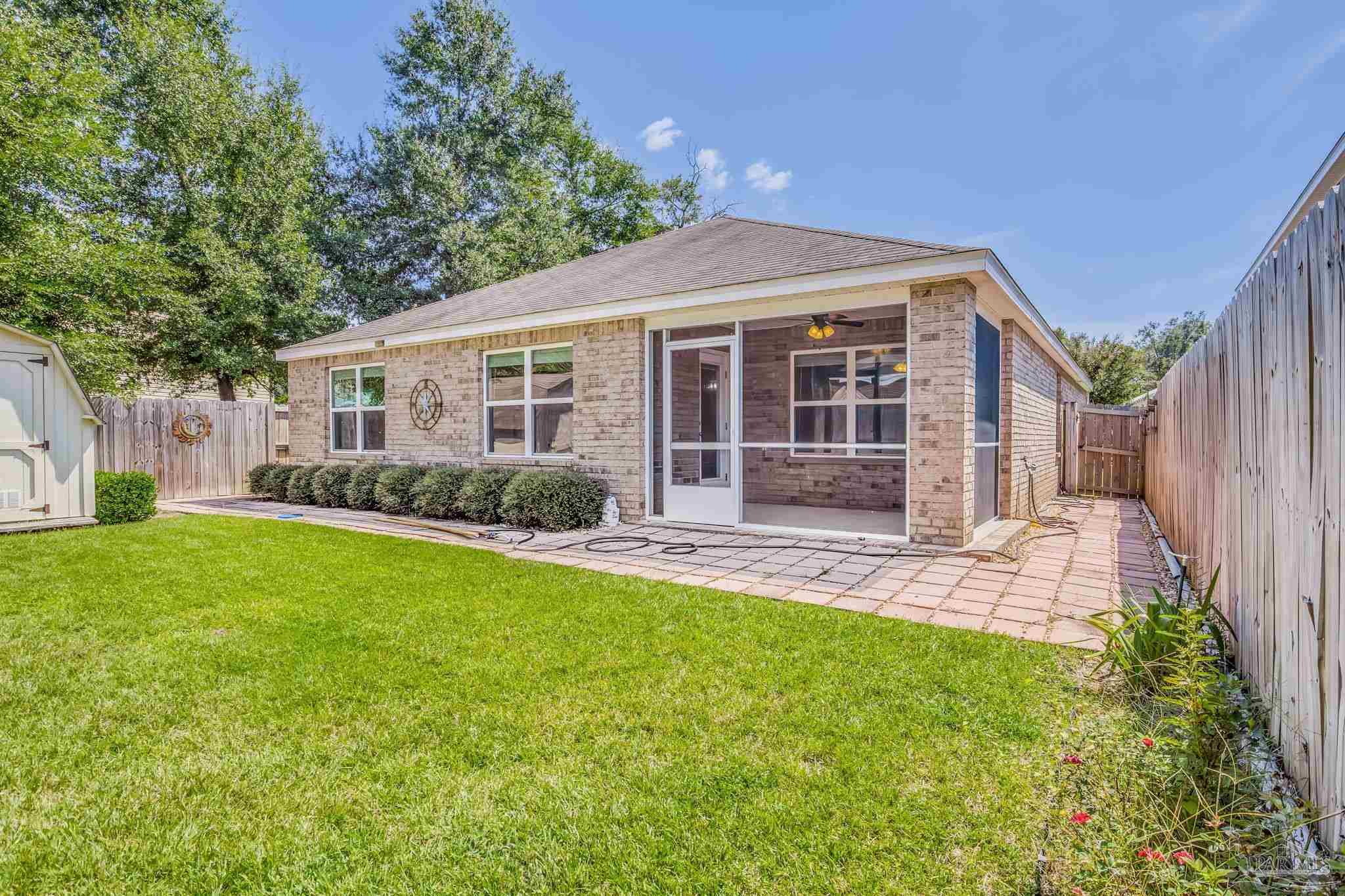 4706 Apple Field Way Milton, FL 32571 - Photo 23 of 52 front view of a house with a yard