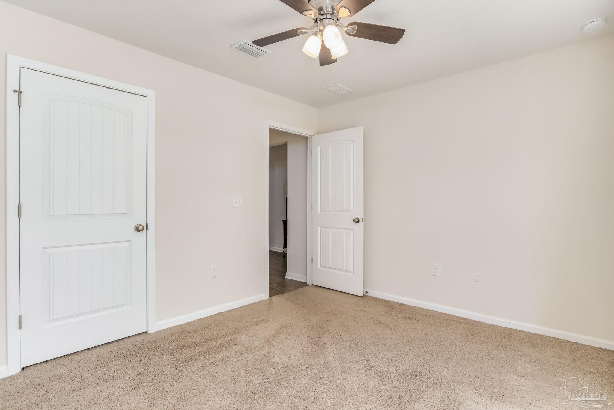 4706 Apple Field Way Milton, FL 32571 - Photo 33 of 52 a view of an empty room