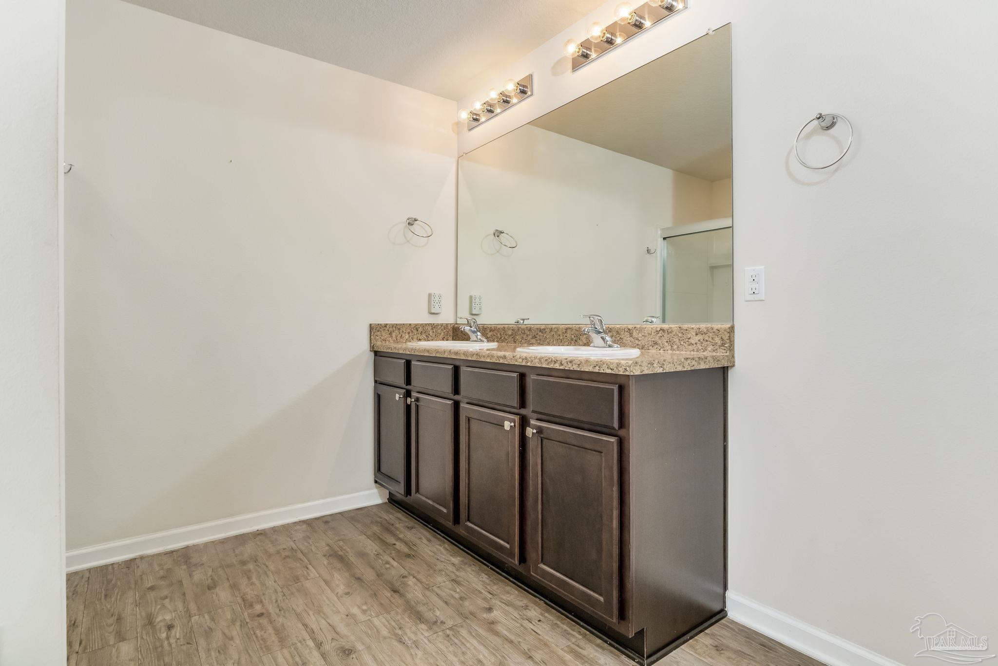 4706 Apple Field Way Milton, FL 32571 - Photo 44 of 52 a utility room with a sink dryer and washer