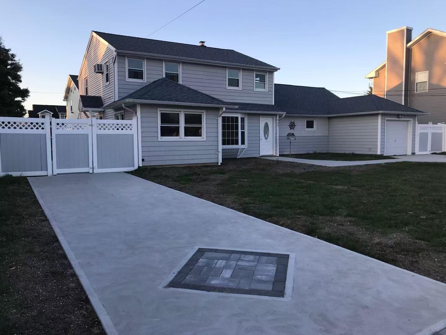 40 Relda Street Plainview, NY 11803 - Photo 1 of 1 View of property featuring a yard and a garage