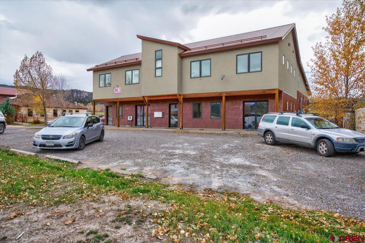653 North Cora Street, Unit 201 Ridgway, CO 81432 - Photo 2 of 18 a view of a car park in front of house
