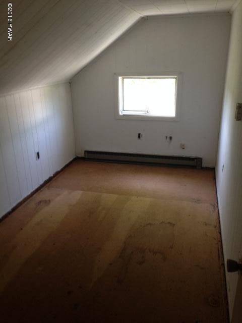 Rear Wesser Road Moscow, PA 18444 - Photo 2 of 10 an empty room with a window