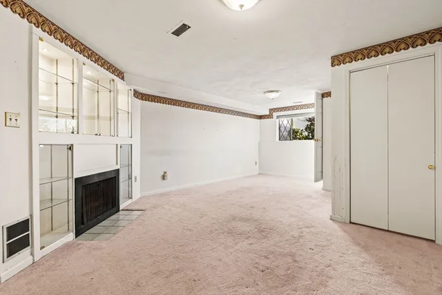 a view of a livingroom with a fireplace