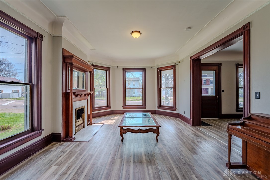 308 Yankee Road Middletown, OH 45044 - Photo 11 of 47 This bright living space features elegant flooring and a charming fireplace, perfect for gatherings.