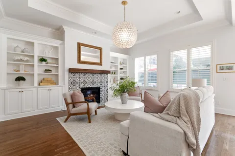 a kitchen with stainless steel appliances granite countertop a sink a stove and cabinets