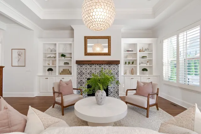 a spacious bedroom with a bed and a large window