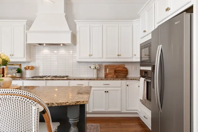 a bedroom with a bed and a book shelf