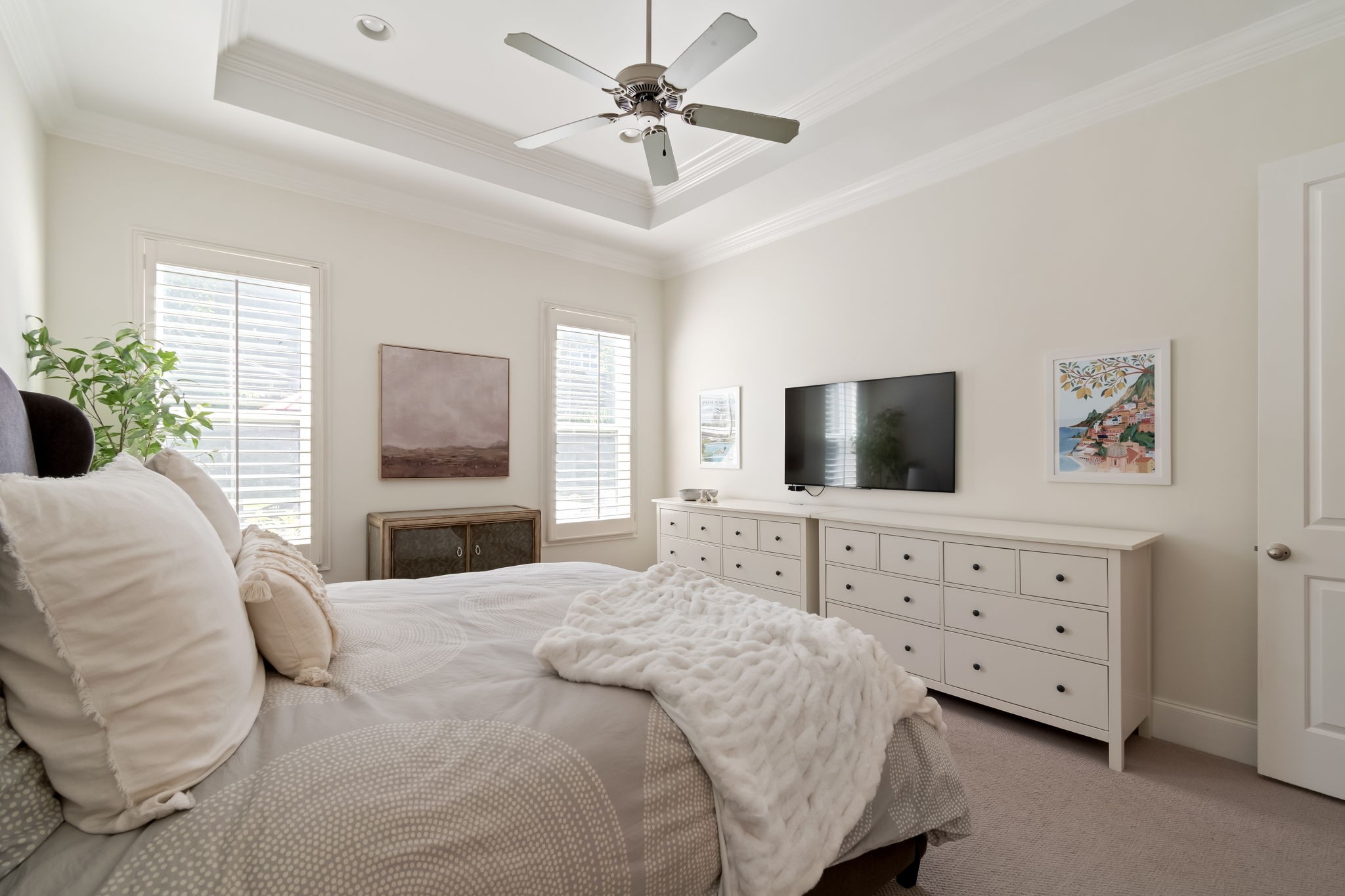 463 Avon River Road Franklin, TN 37064 - Photo 40 of 91 a bedroom with a bed a chandelier and a television