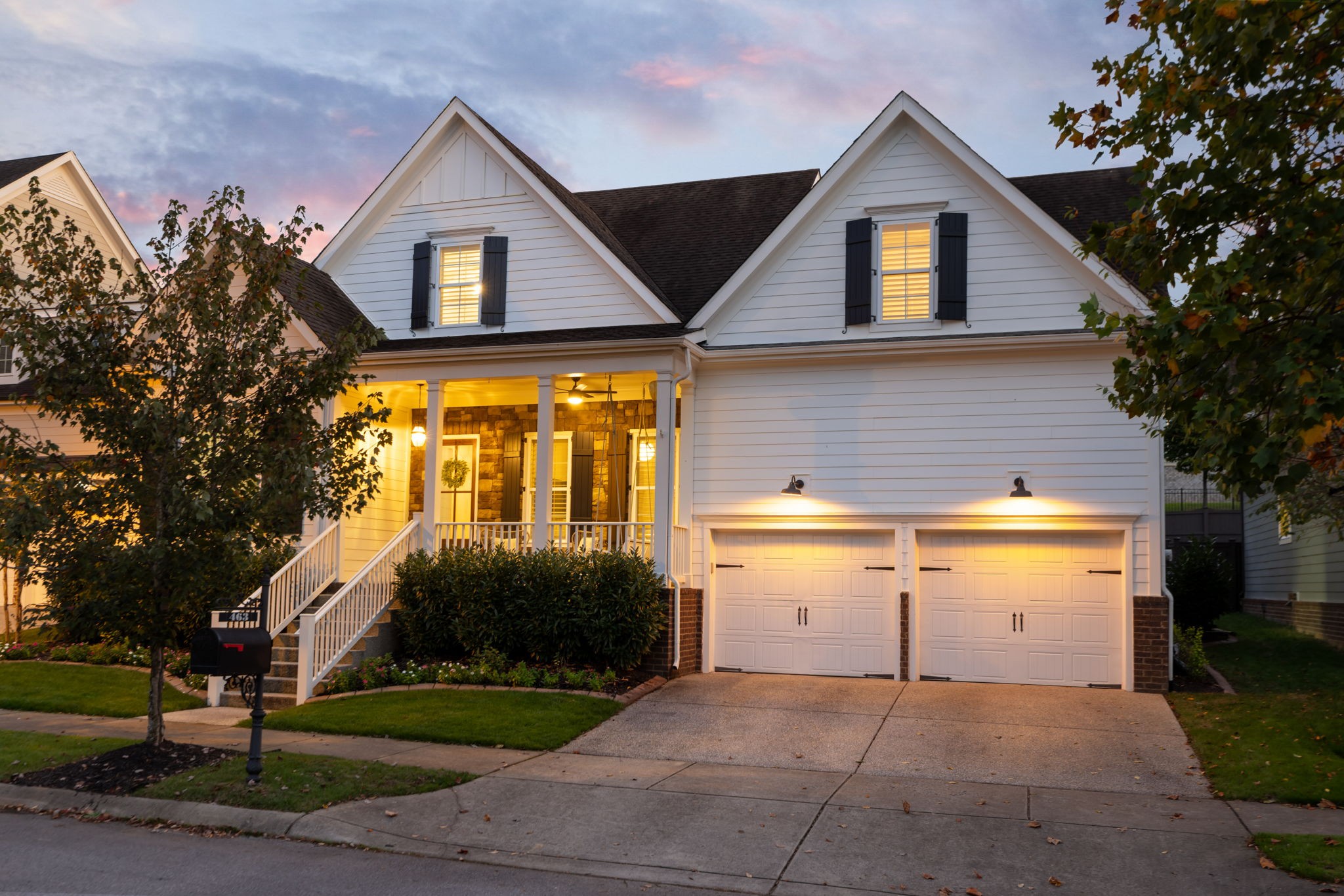 463 Avon River Road Franklin, TN 37064 - Photo 4 of 91 a front view of a house with a yard and garage