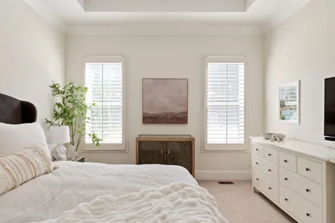 a patio with a patio table and chairs