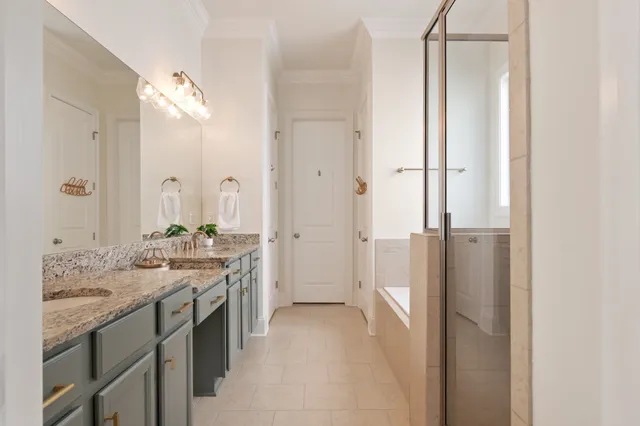 a view of a house with backyard porch and sitting area