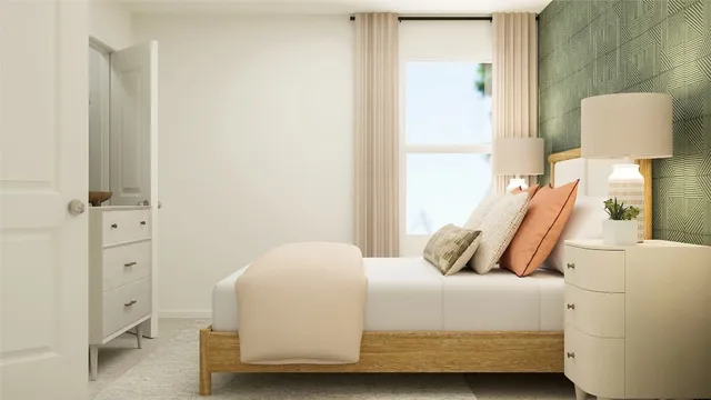 a bedroom with a bed and a mirror