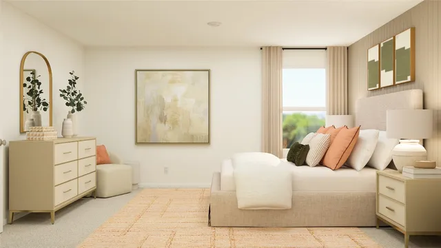 a bedroom with a bed and painting on the wall