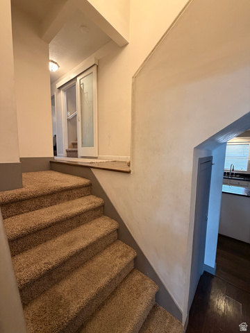 110 South 200 East Springville, UT 84663 - Photo 10 of 23 Stairway featuring wood finished floors and baseboards