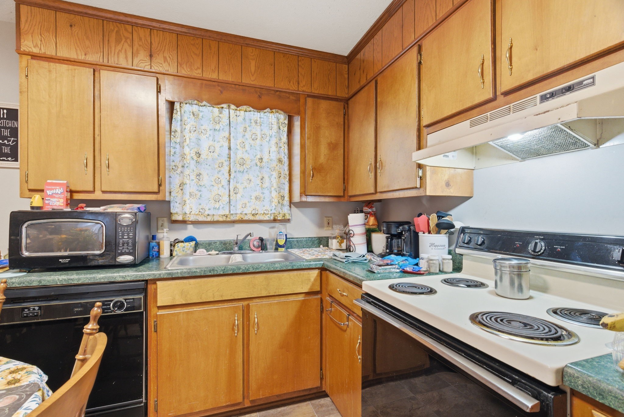 111 Gayla Court Portland, TN 37148 - Photo 11 of 47 a kitchen with a sink a stove and cabinets