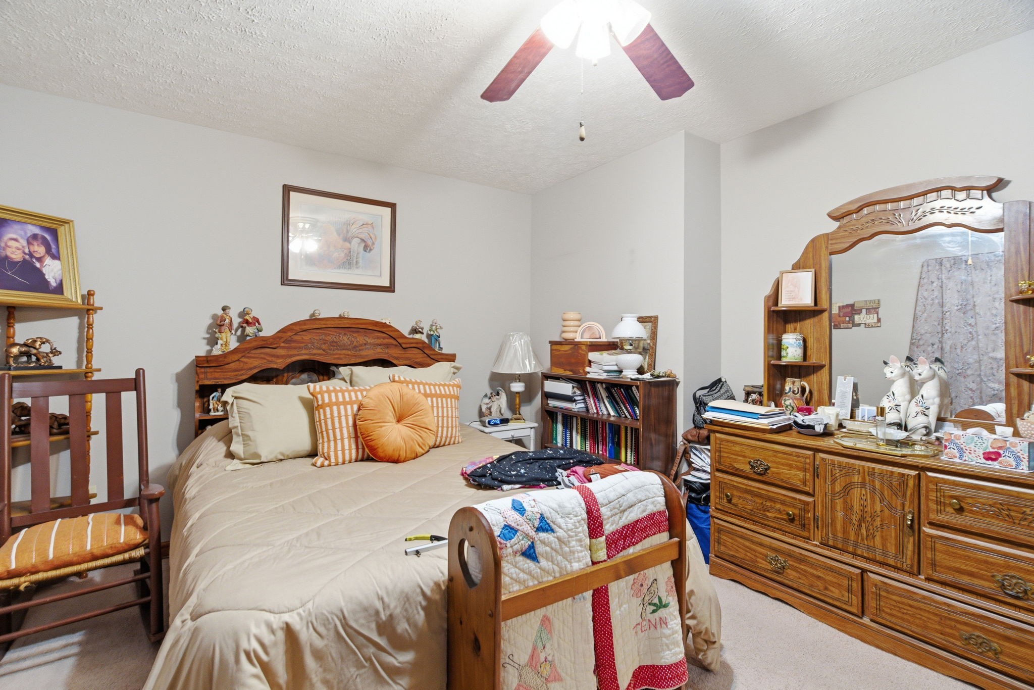 111 Gayla Court Portland, TN 37148 - Photo 19 of 47 a bedroom with a bed and a chandelier